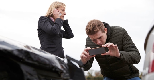 people in the aftermath of a car accident