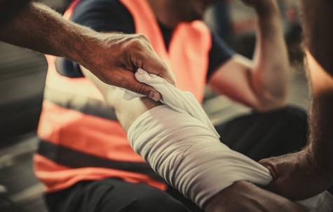 Construction worker with hurt arm