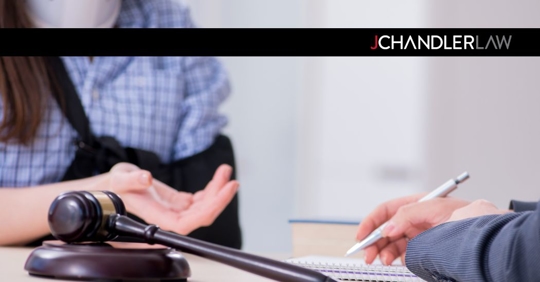 injured woman talking to an attorney